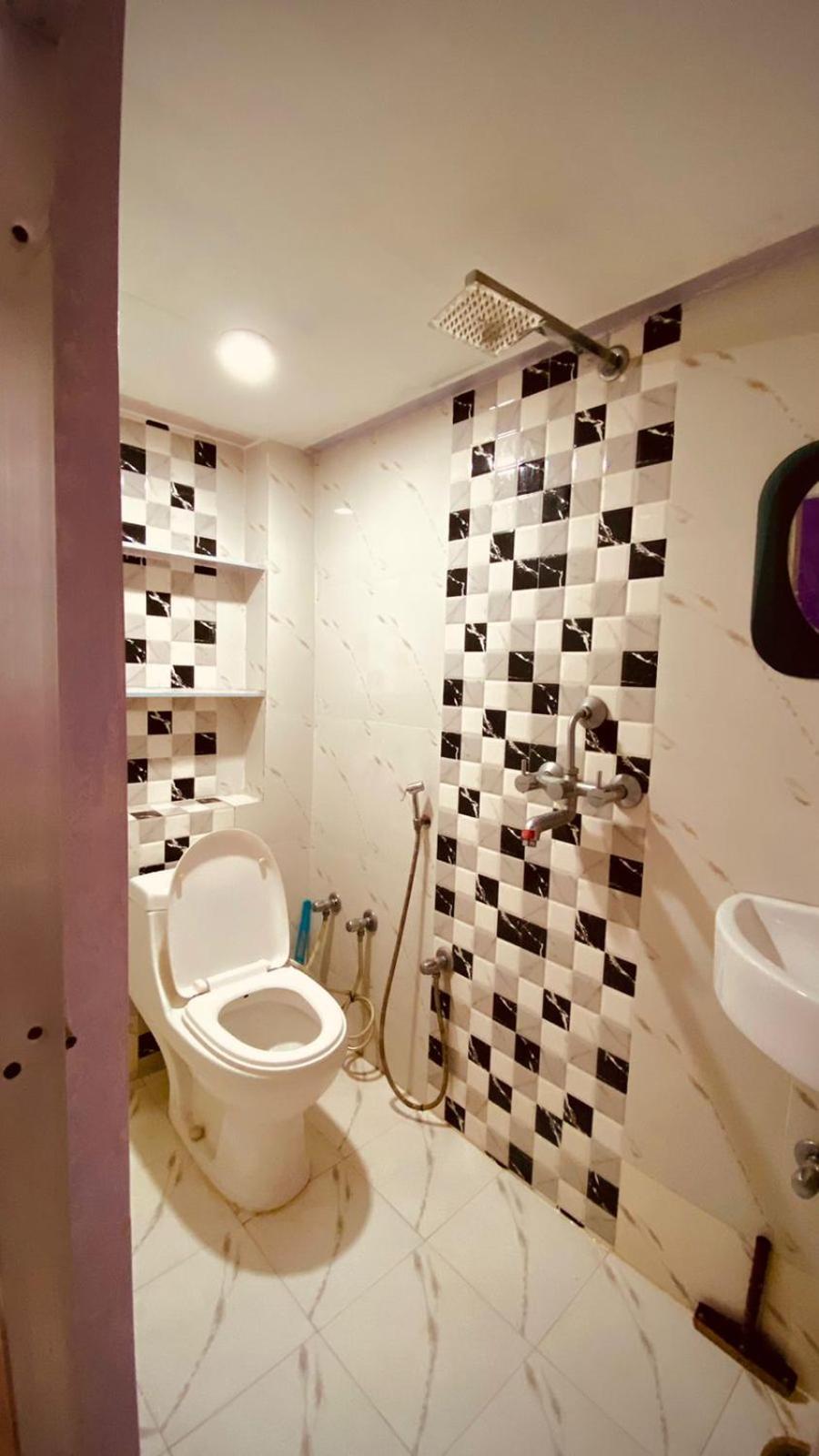 Marigold Guest House فاراناسي الغرفة الصورة